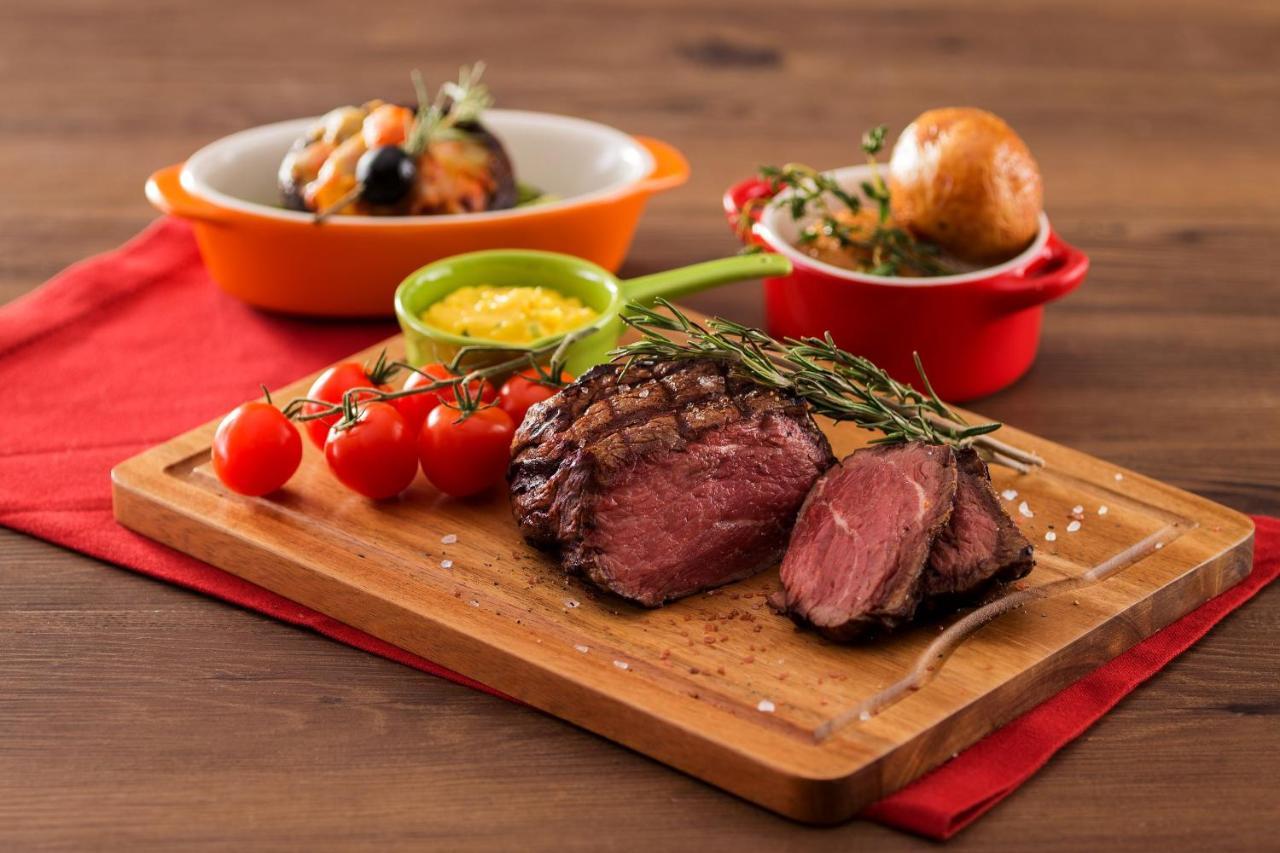 Hong Kong Gold Coast Hotel Εξωτερικό φωτογραφία A steak prepared with the dry-aging technique
